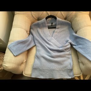 Sweater faux wrap chunky knit with fitted waist.